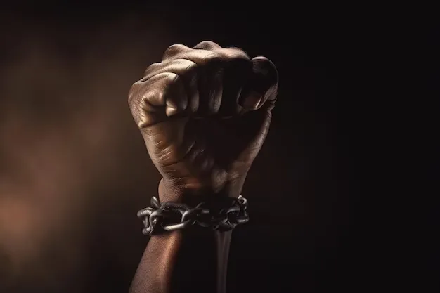 Mão negra com uma corrente em volta dela que diz 'liberdade'. Foto: Ilustrativa/Freepik