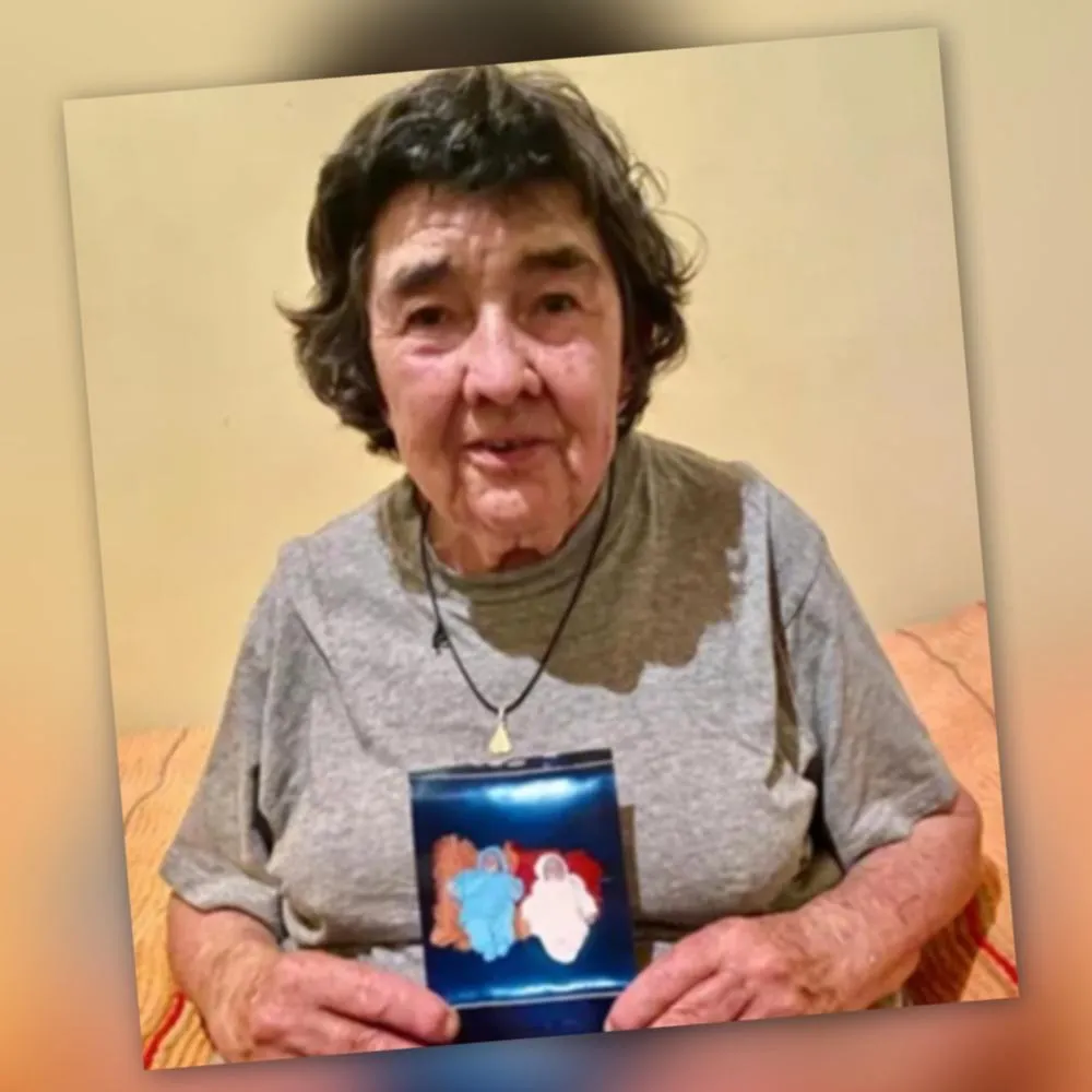Maria Aparecida da Silva, com a foto dos filhos recém-nascido. Foto: Divulgação