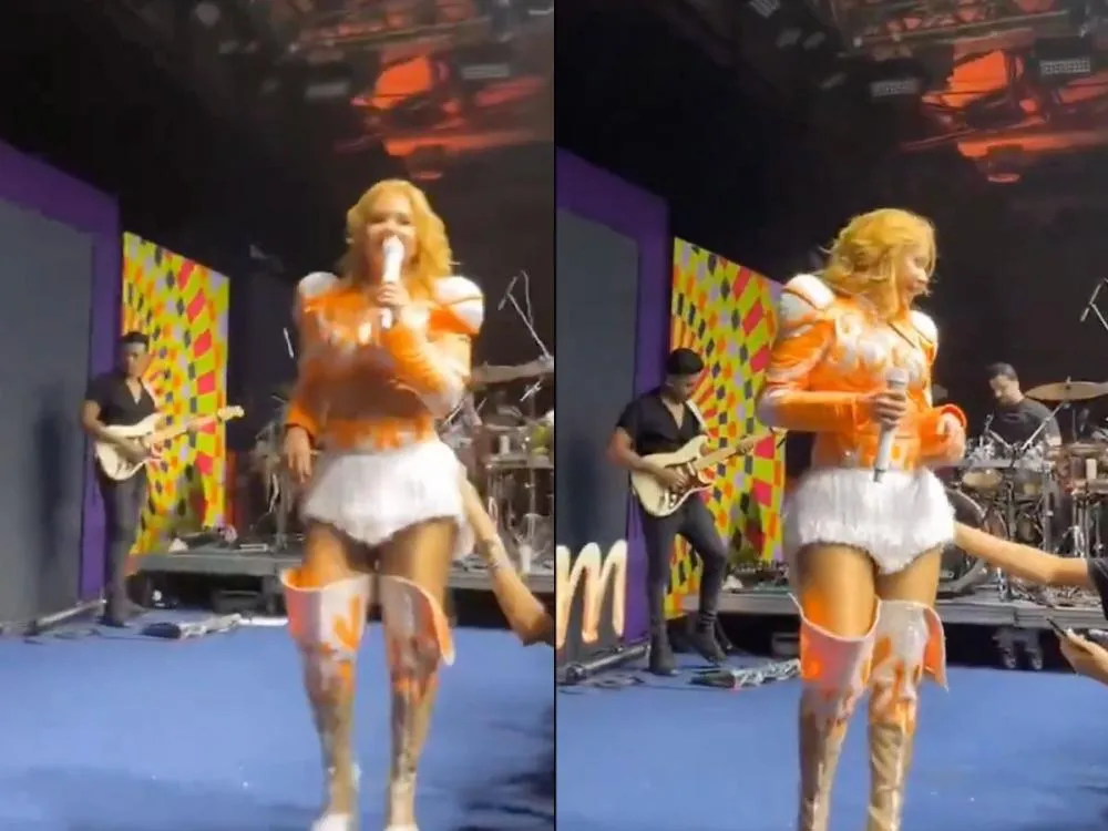 Joelma sendo tocada por fã. Foto: Reprodução/X